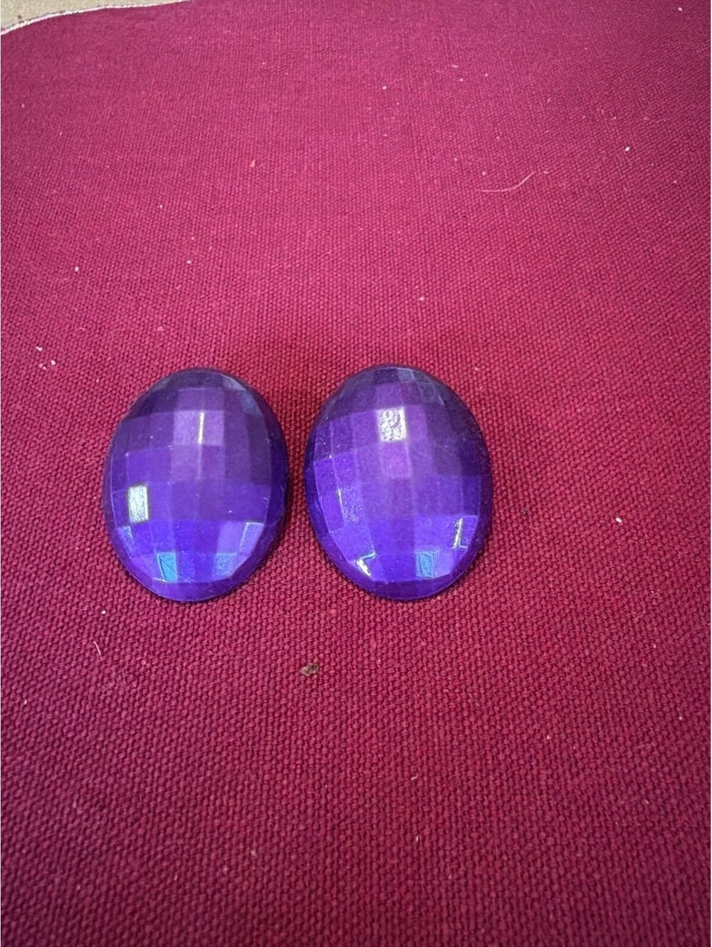Purple Oval metal purple pierce costume jewelry hangs 2’ish inch